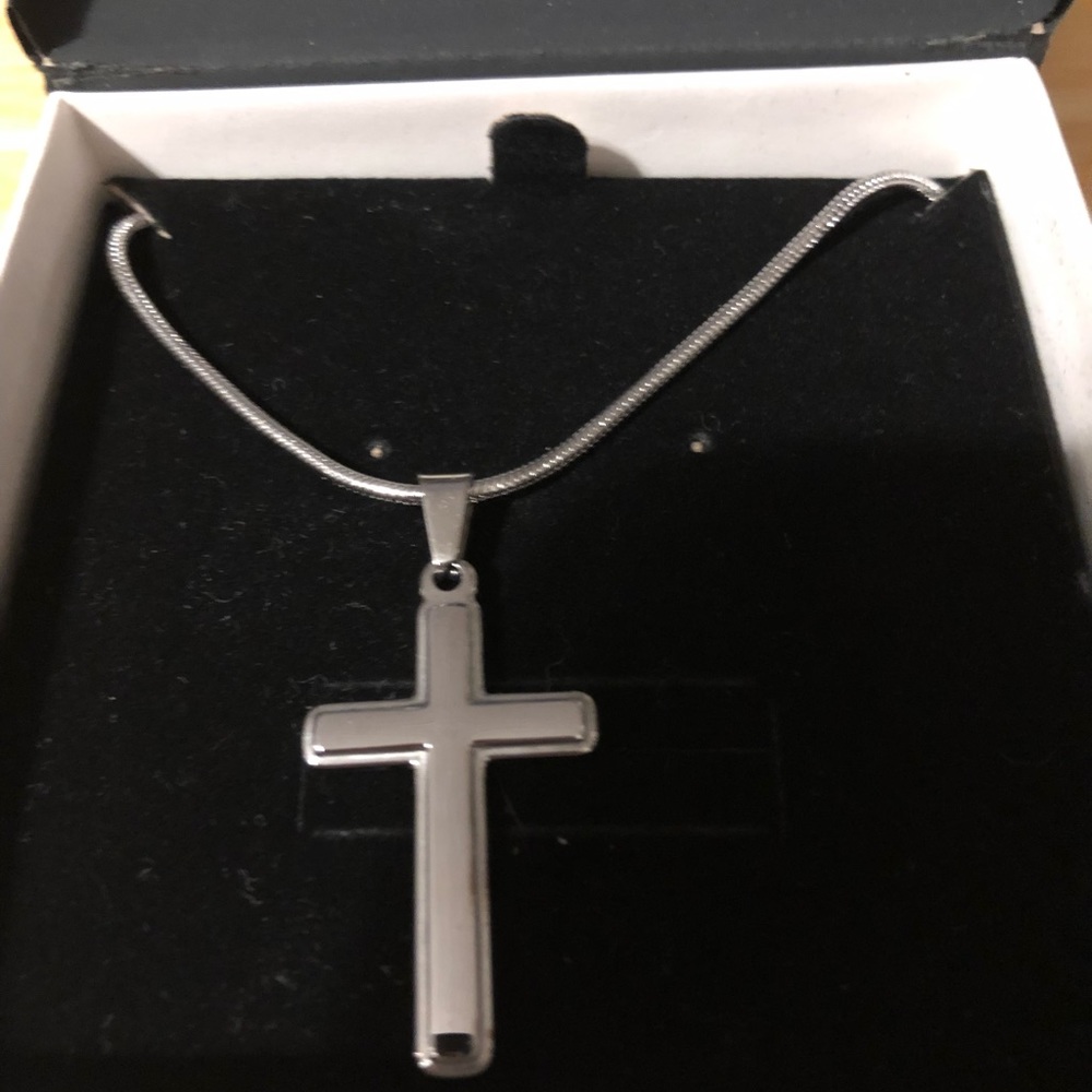Womens cross necklace. New in box but no tags. 16 in chain with a 6 in extender